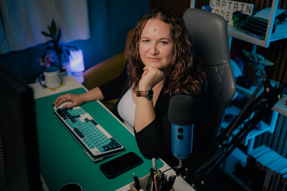 Marisa at her computer in her recording studio